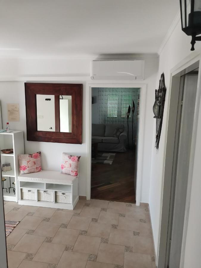 Apartmani Godinic Palit Buitenkant foto