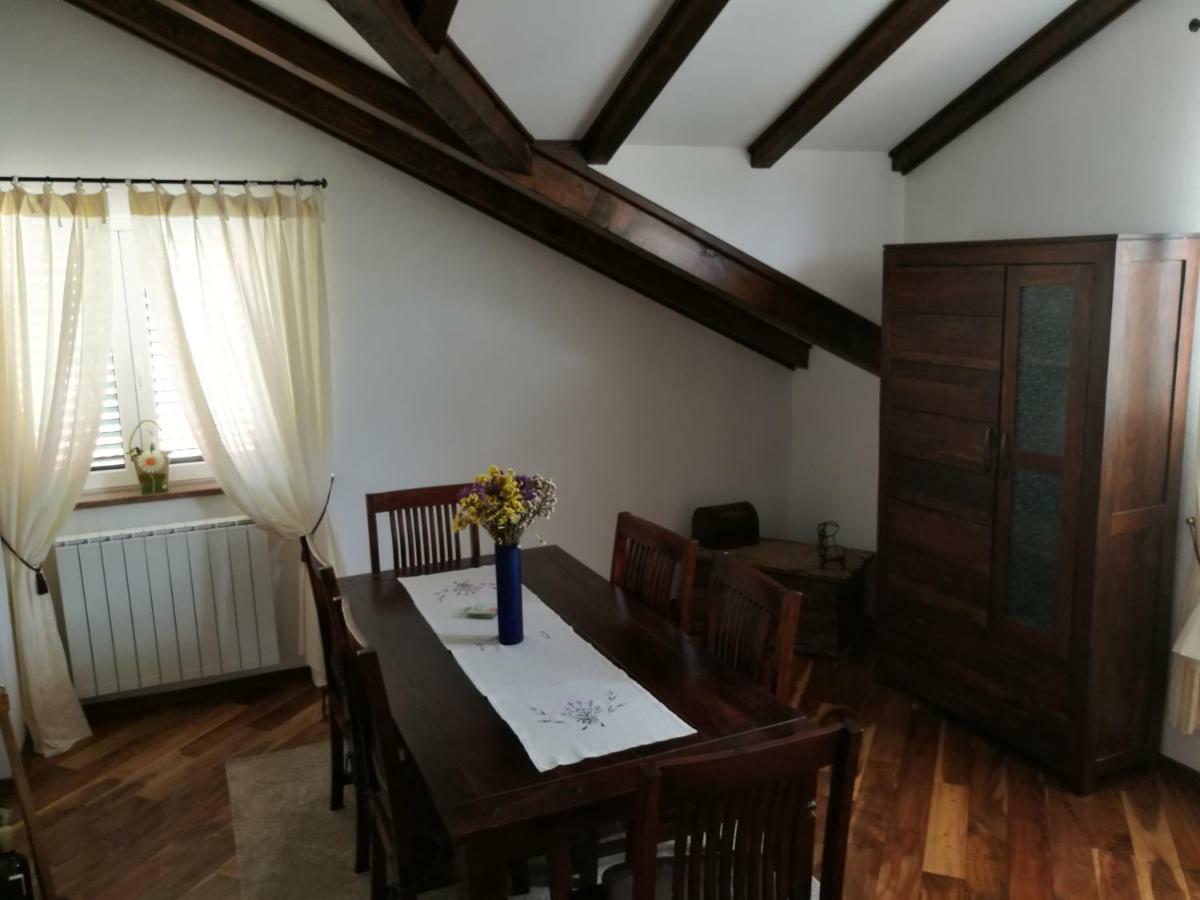 Apartmani Godinic Palit Buitenkant foto